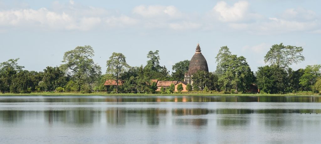 Ahom tank tempel, Sibsagar, Brahmaputra river, Assam, India - Shutterstock