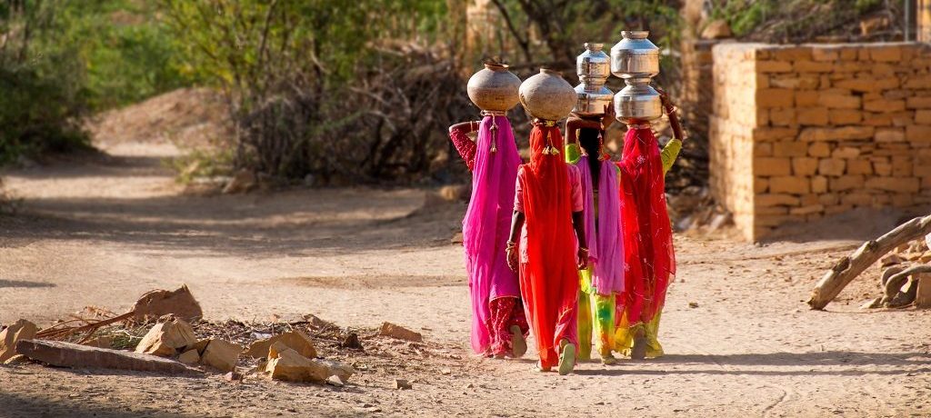 Waterdragers, Desert, Jailsalmer, Rajasthan,India - Shutterstock